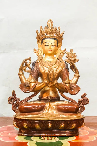 Chenrezig statue depicts the Bodhisattva of Compassion in four-armed form seated on a lotus pedestal.  Ideal for meditation altars or spiritual decor, it inspires mindfulness, healing, and heartfelt compassion in any space.