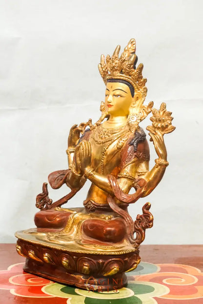 Chenrezig statue depicts the Bodhisattva of Compassion in four-armed form seated on a lotus pedestal.  Ideal for meditation altars or spiritual decor, it inspires mindfulness, healing, and heartfelt compassion in any space.