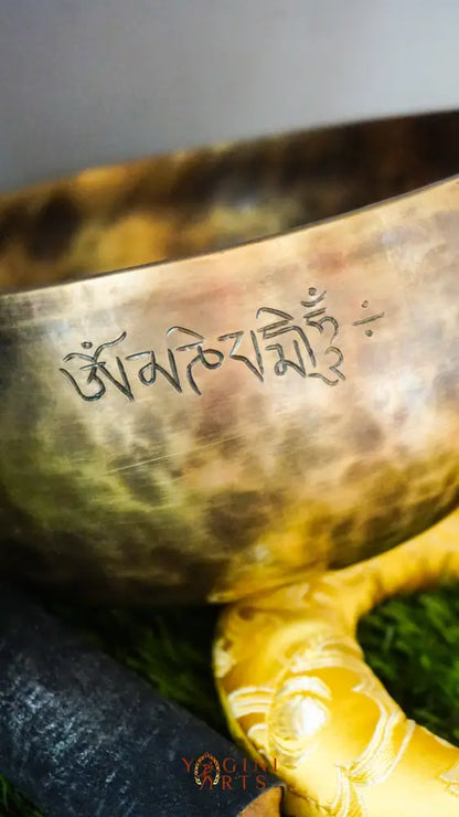 Moon Singing Bowl with lunar patterns, producing deep, resonant tones that enhance meditation, energy healing, and spiritual balance, hand-crafted in Nepal.