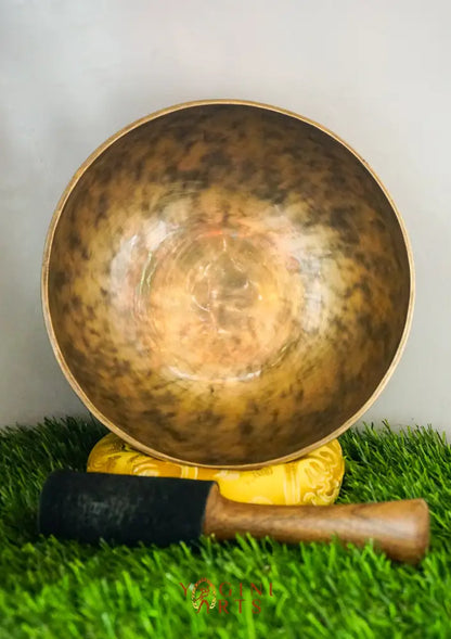 Moon Singing Bowl with lunar patterns, producing deep, resonant tones that enhance meditation, energy healing, and spiritual balance, hand-crafted in Nepal.