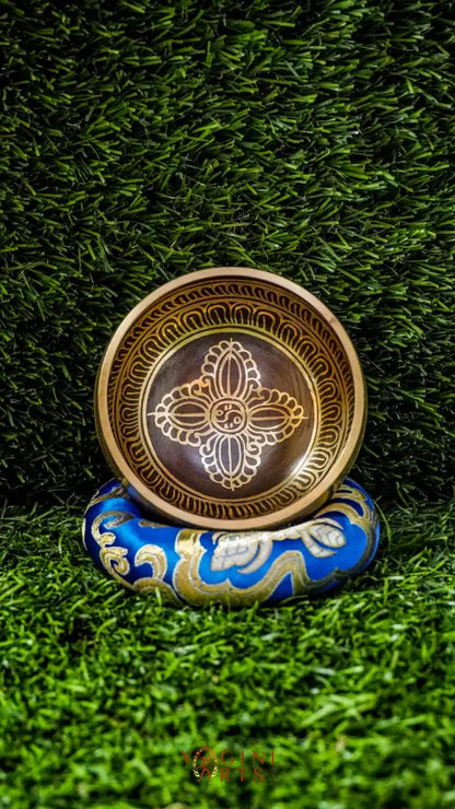 Harness grounding energy with this Double Dorje Singing Bowl, adorned with protective symbolism and sacred mantras. Its rich, resonant tones create the perfect foundation for meditation and mindfulness practice. Includes mallet and cushion for immediate use.