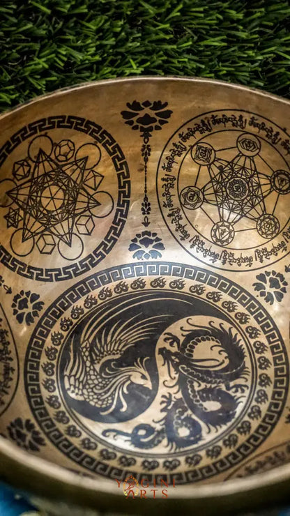 Balance yin and yang with our handcrafted Dragon and Phoenix Singing Bowl. Featuring the dragon and phoenix inside, it symbolizes strength, renewal, and harmony. Sacred mantras around the rim enhance your meditation space with peace and spiritual energy. Handmade by skilled artisans, it produces rich, balanced tones perfect for mindfulness, healing, and rituals. Compact and powerful, it fits beautifully in any sacred space or travel kit.
