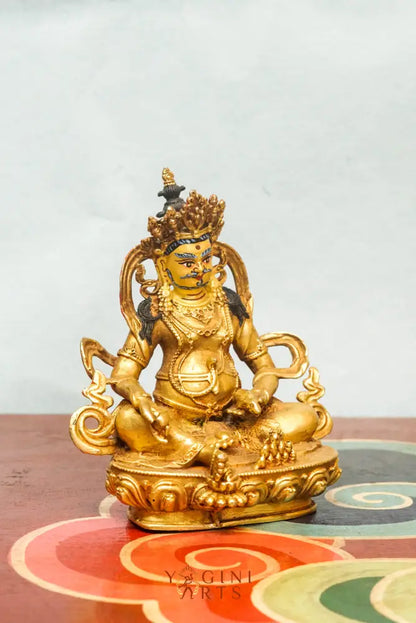 Gold-plated Zambala statue, the Buddhist deity of wealth and prosperity.   A symbol of good fortune and generosity.
