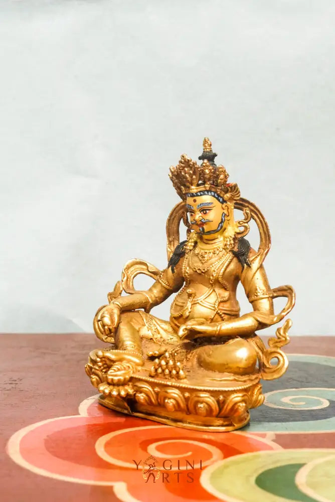 Gold-plated Zambala statue, the Buddhist deity of wealth and prosperity.   A symbol of good fortune and generosity.