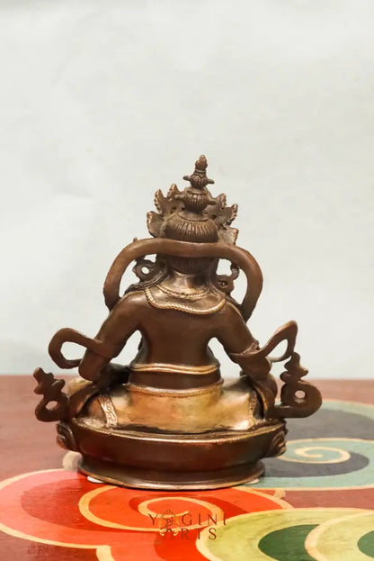 The Zambala statue known as the Buddhist deity of prosperity, Zambala holds a jewel-spitting mongoose and treasure vase and it’s perfect for spiritual spaces or thoughtful gifts.