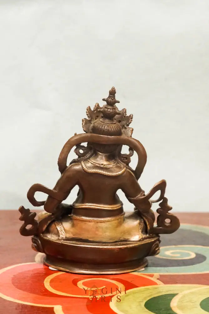 The Zambala statue known as the Buddhist deity of prosperity, Zambala holds a jewel-spitting mongoose and treasure vase and it’s perfect for spiritual spaces or thoughtful gifts.
