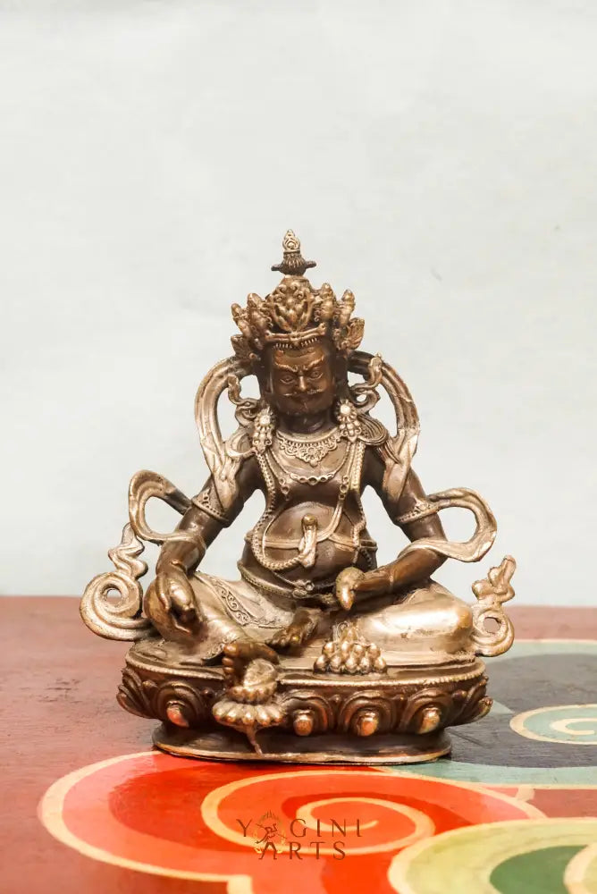 The Zambala statue known as the Buddhist deity of prosperity, Zambala holds a jewel-spitting mongoose and treasure vase and it’s perfect for spiritual spaces or thoughtful gifts.
