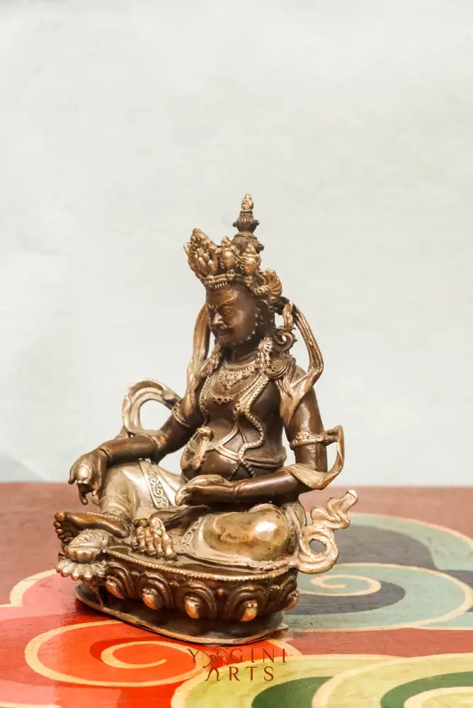 The Zambala statue known as the Buddhist deity of prosperity, Zambala holds a jewel-spitting mongoose and treasure vase and it’s perfect for spiritual spaces or thoughtful gifts.