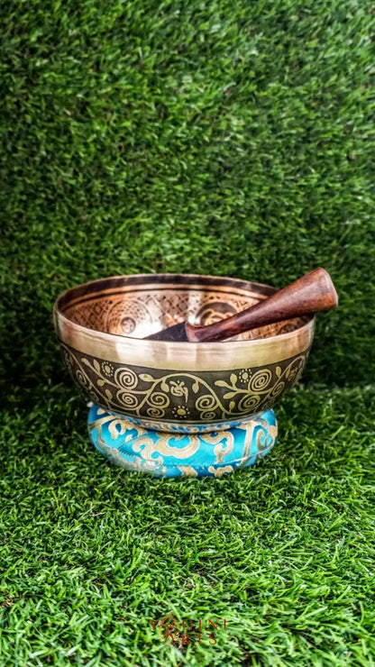 The Elephant Singing Bowl features a wise elephant symbol and floral patterns with the Om Mani Padme Hum chant. It produces a deep, grounding tone that brings calm, strength, and focus. Perfect for meditation and reflection. Includes wooden mallet and silk cushion.