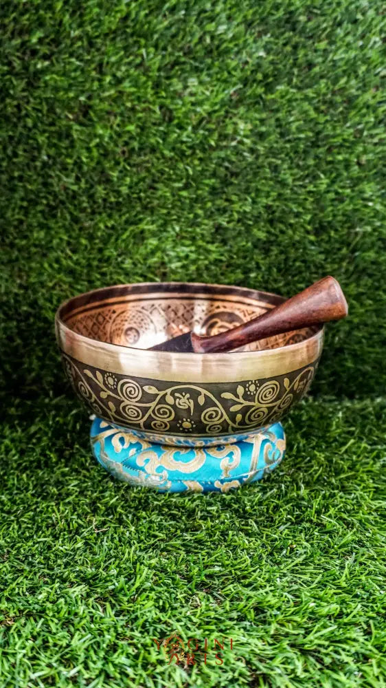 The Elephant Singing Bowl features a wise elephant symbol and floral patterns with the Om Mani Padme Hum chant. It produces a deep, grounding tone that brings calm, strength, and focus. Perfect for meditation and reflection. Includes wooden mallet and silk cushion.