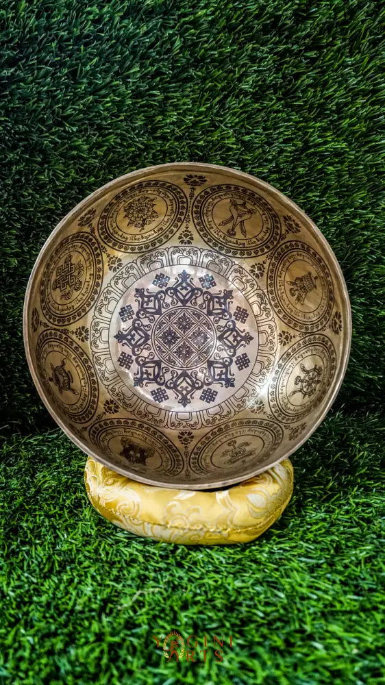 The Flower Singing Bowl features a central lotus flower and the eight sacred Astamangala symbols, all arranged in a harmonious, floral rhythm. Surrounded by delicate mandala motifs, it creates a steady, calming sound that supports meditation and brings sacred beauty into your space.