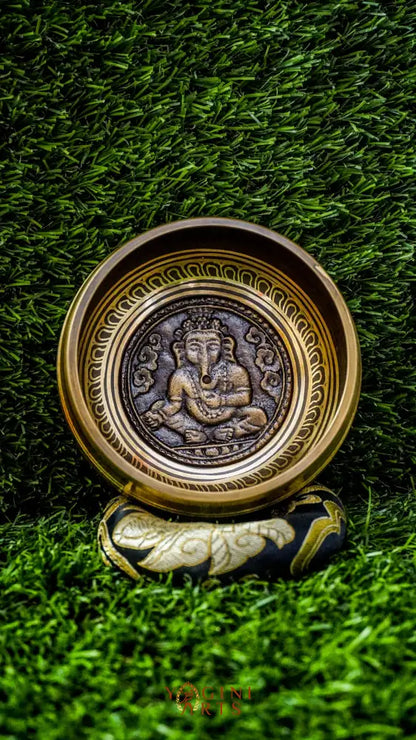 The Ganesh Singing Bowl carries the energy of new beginnings and wisdom. With Lord Ganesh carved at its center, it symbolizes success, protection, and clarity. Simple outer patterns keep the focus on this sacred figure. Its smooth, grounding tone calms the mind and supports meditation or intention setting, making it a meaningful companion for strength and mindful energy.