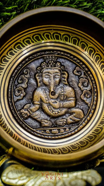 The Ganesh Singing Bowl carries the energy of new beginnings and wisdom. With Lord Ganesh carved at its center, it symbolizes success, protection, and clarity. Simple outer patterns keep the focus on this sacred figure. Its smooth, grounding tone calms the mind and supports meditation or intention setting, making it a meaningful companion for strength and mindful energy.