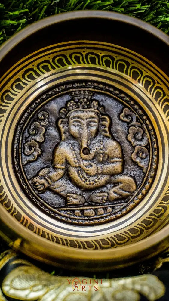 The Ganesh Singing Bowl carries the energy of new beginnings and wisdom. With Lord Ganesh carved at its center, it symbolizes success, protection, and clarity. Simple outer patterns keep the focus on this sacred figure. Its smooth, grounding tone calms the mind and supports meditation or intention setting, making it a meaningful companion for strength and mindful energy.