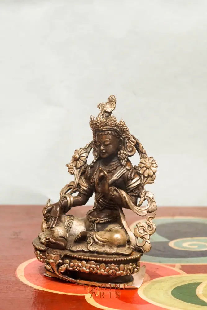 Green Tara statue embodies compassion and enlightened action. It symbolizes protection, purity, and swift aid and it is ideal for meditation, altar display, or spiritual decor inspiring peace and healing.