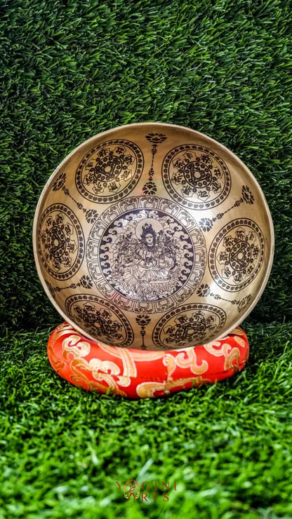 The Green Tara Singing Bowl brings compassion and protection to your space. Featuring Green Tara at its center and surrounded by calming mandala patterns, it produces a soft, steady sound that helps soothe the mind and deepen meditation. A gentle companion for peace and healing.