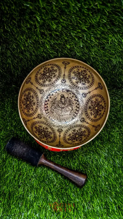 The Green Tara Singing Bowl brings compassion and protection to your space. Featuring Green Tara at its center and surrounded by calming mandala patterns, it produces a soft, steady sound that helps soothe the mind and deepen meditation. A gentle companion for peace and healing.