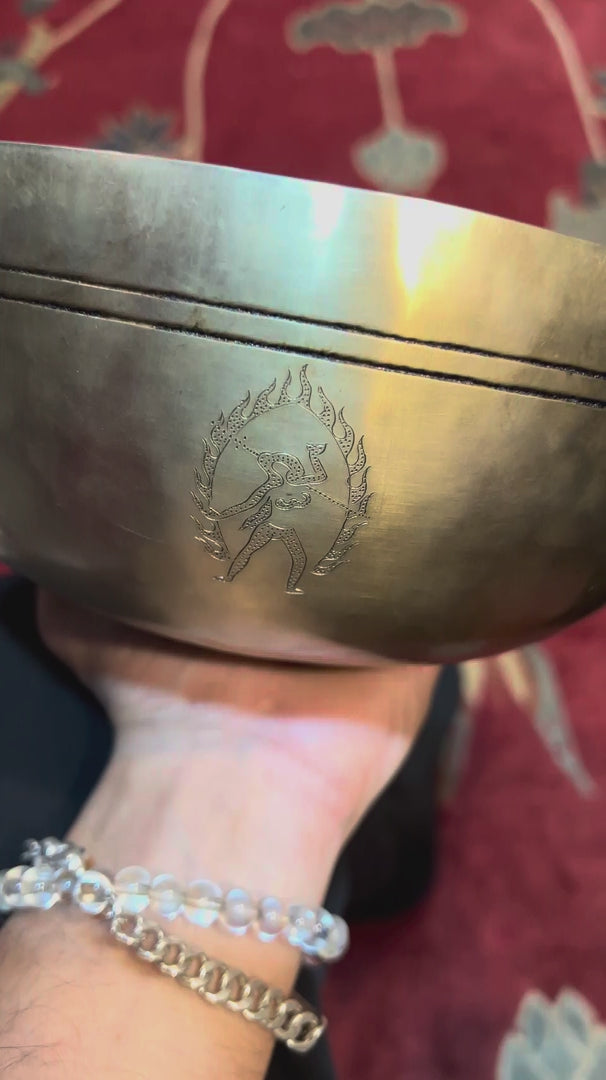 Load video: Interior view of a handcrafted Kalchakra Mandala singing bowl showing intricate geometric engraving