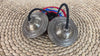 Close up of Tibetan Lotus Tingsha Cymbals showing detailed circular borders and traditional engraved symbols.