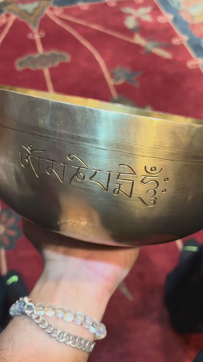 Handcrafted Buddha Singing Bowl from Nepal with engraved Buddha design for meditation and mindfulness