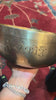 Handcrafted Buddha Singing Bowl from Nepal with engraved Buddha design for meditation and mindfulness