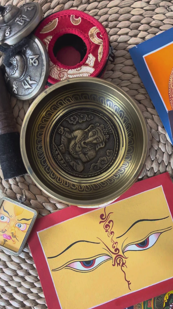 Load video: Ganesha singing bowl set with tingsha, suede mallet, cushion, Buddhist artwork and pendant