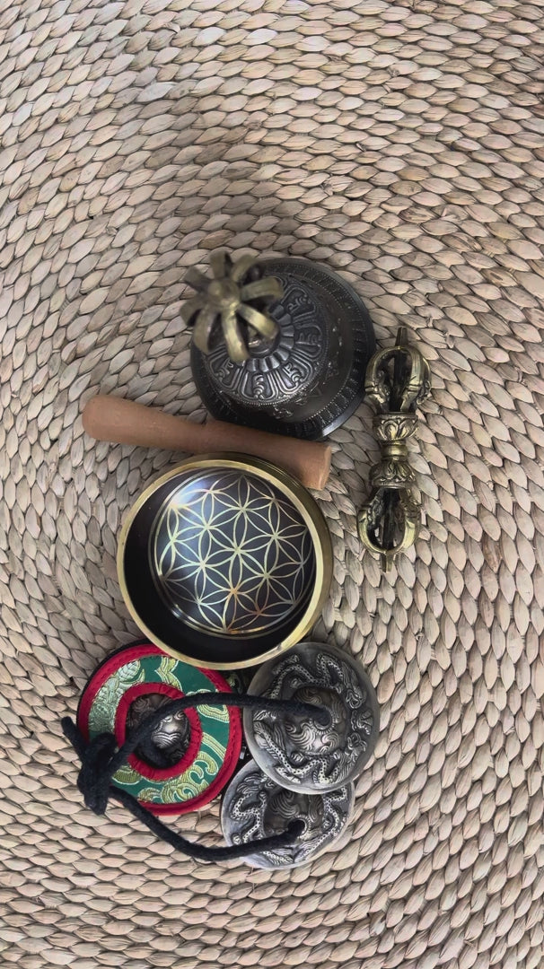 Complete Flower of Life singing bowl ritual set with Ashtamangala tingsha, Buddhist bell, vajra, wooden mallet and meditation accessories from Nepal