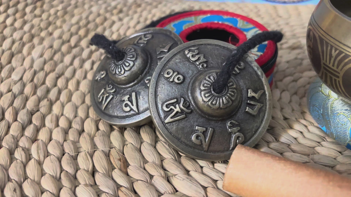 Complete lotus singing bowl ritual set with Ashtamangala tingsha, Buddhist bell, vajra, wooden mallet and meditation accessories from Nepal