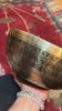Handmade Nepal singing bowl with Shakyamuni Buddha carved on the outside, for meditation and sound healing