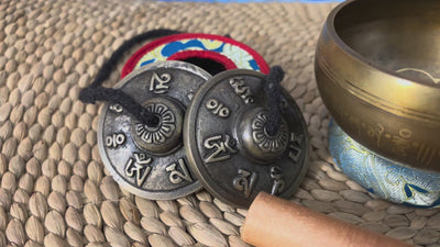 Complete Buddha singing bowl ritual set with Ashtamangala tingsha, Buddhist bell, vajra, wooden mallet and meditation accessories from Nepal
