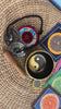 Yin Yang singing bowl meditation set with Ashtamangala tingsha, wooden mallet, cushion and Buddhist devotional accessories from Nepal