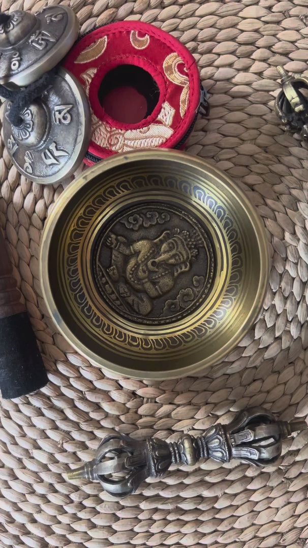 Complete Ganesha singing bowl set with tingsha, suede mallet, cushion, bell and vajra