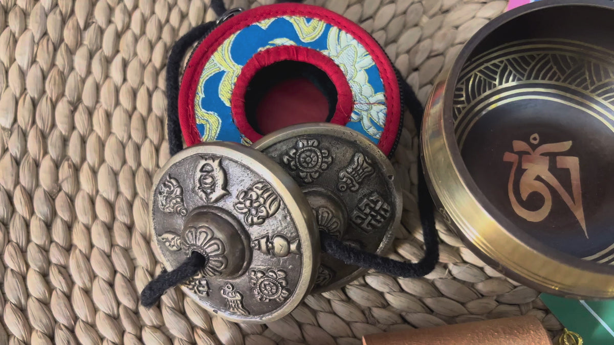 Complete Himalayan Buddhist ritual set with mantra singing bowl, Ashtamangala tingsha, bell, vajra and meditation accessories from Nepal
