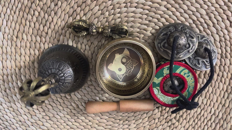 Complete Yin Yang fish singing bowl ritual set with Ashtamangala tingsha, Buddhist bell, vajra, wooden mallet and meditation accessories from Nepal