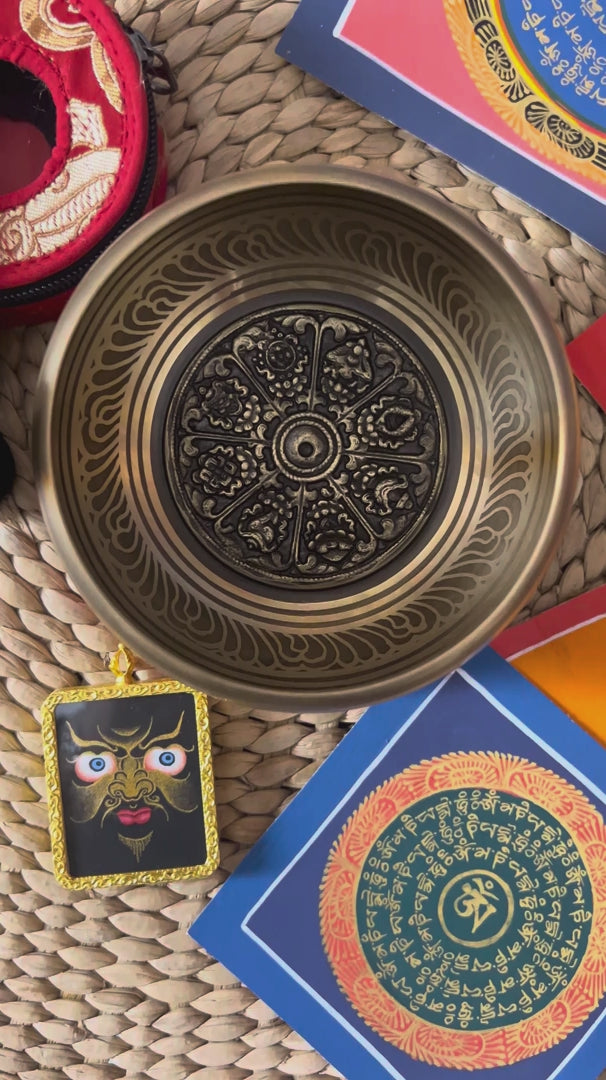 Auspicious singing bowl set with tingsha, suede mallet, cushion, Buddhist artwork and pendant