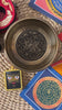 Auspicious singing bowl set with tingsha, suede mallet, cushion, Buddhist artwork and pendant